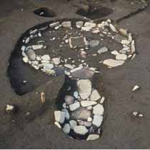 大月遺跡の柄鏡形敷石住居の写真